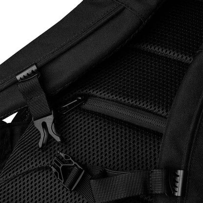 Close-up view of black Divitia utility backpack with adjustable straps and breathable back panel